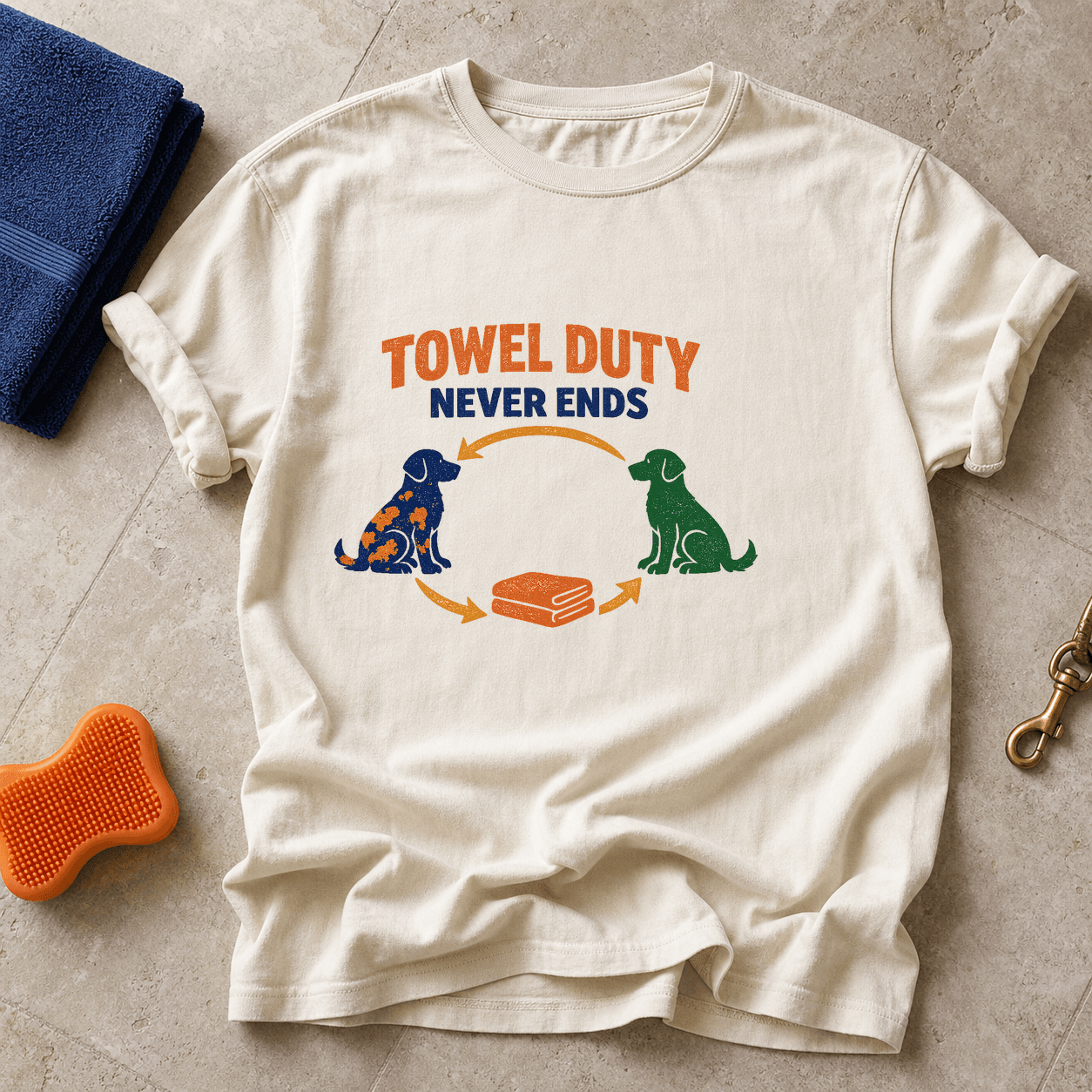 Ivory Comfort Colors T-shirt printed with Towel Duty Never Ends above a circular muddy dog, towel and clean dog routine.