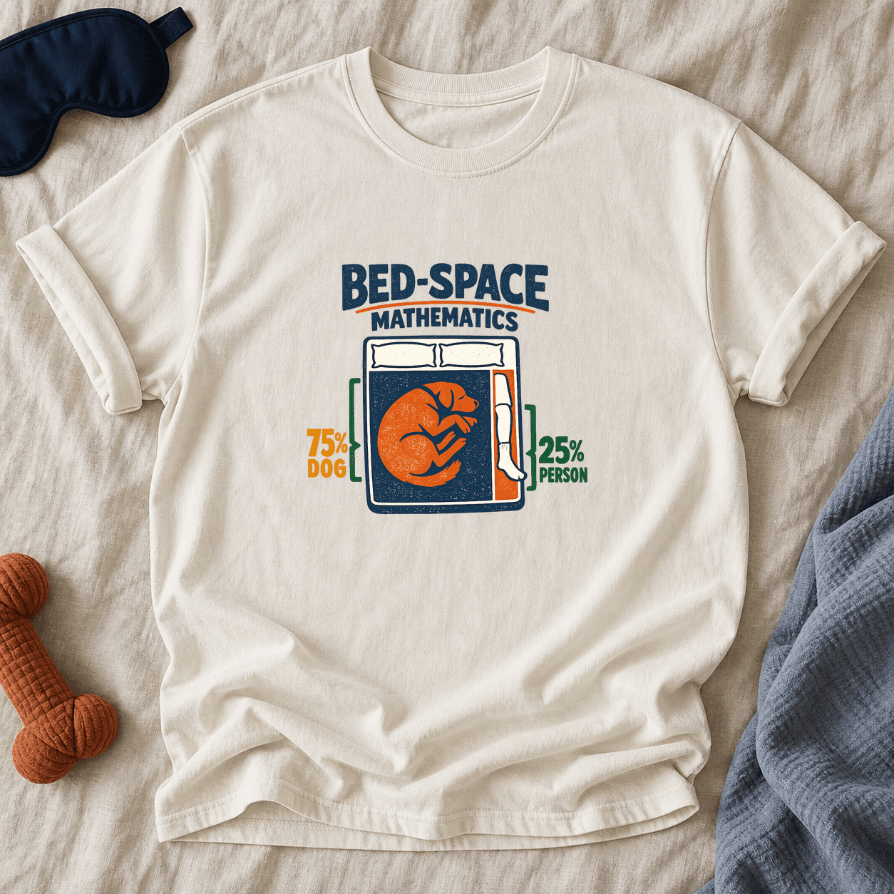 Ivory Comfort Colors T-shirt printed with Bed-Space Mathematics above a top-down bed diagram labelled 75% dog and 25% person.